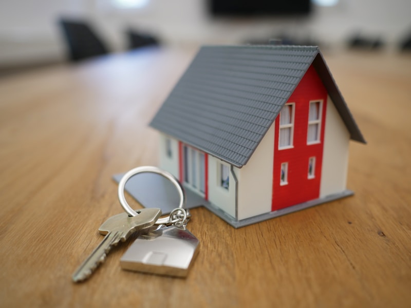 Real estate agency website design featuring property listings, advanced search, agent profiles, and lead generation forms